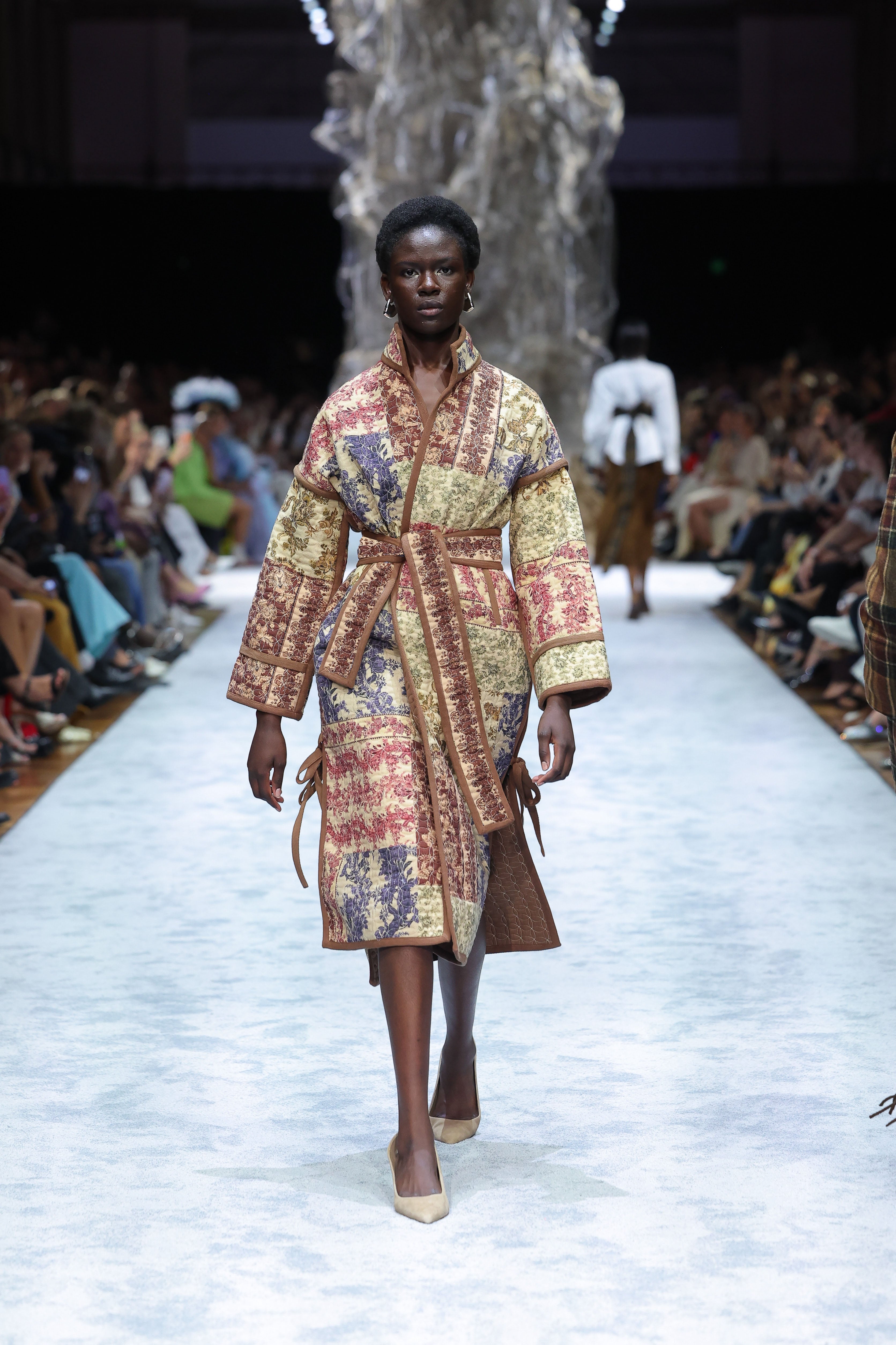 She is Intricate patchwork quilted coat