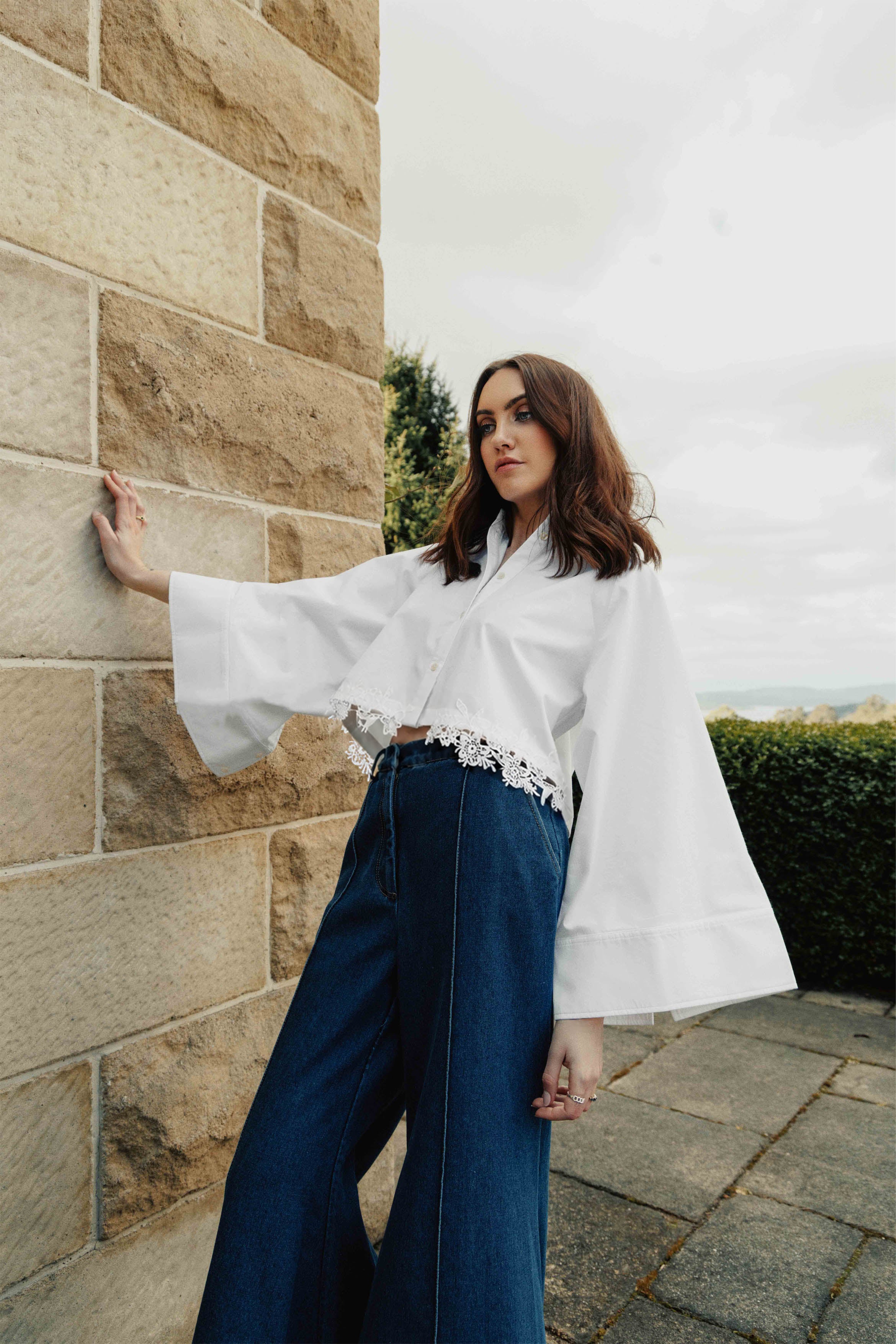 She is Bold lace trim shirt