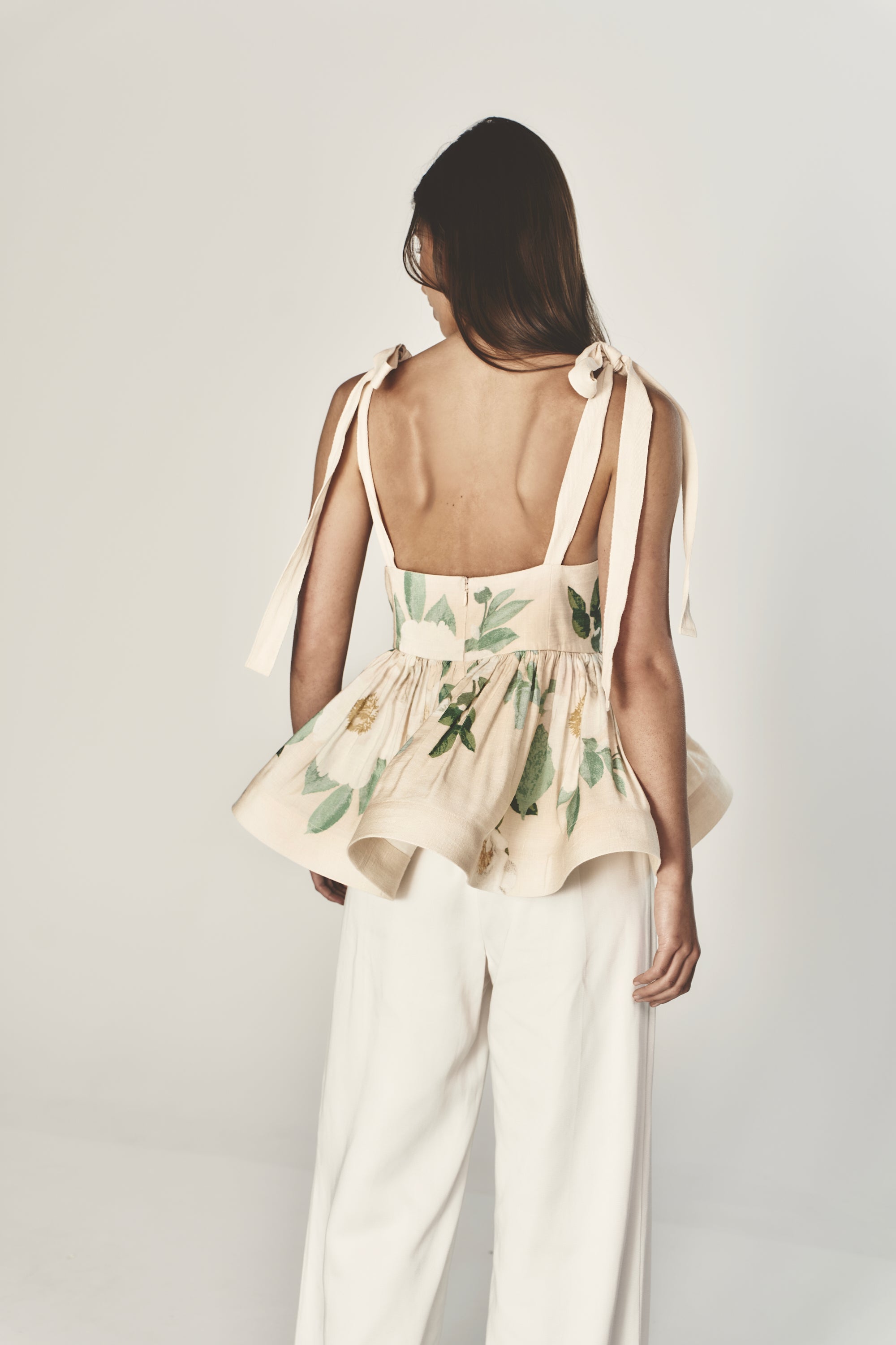 She is Tenacious linen peplum top