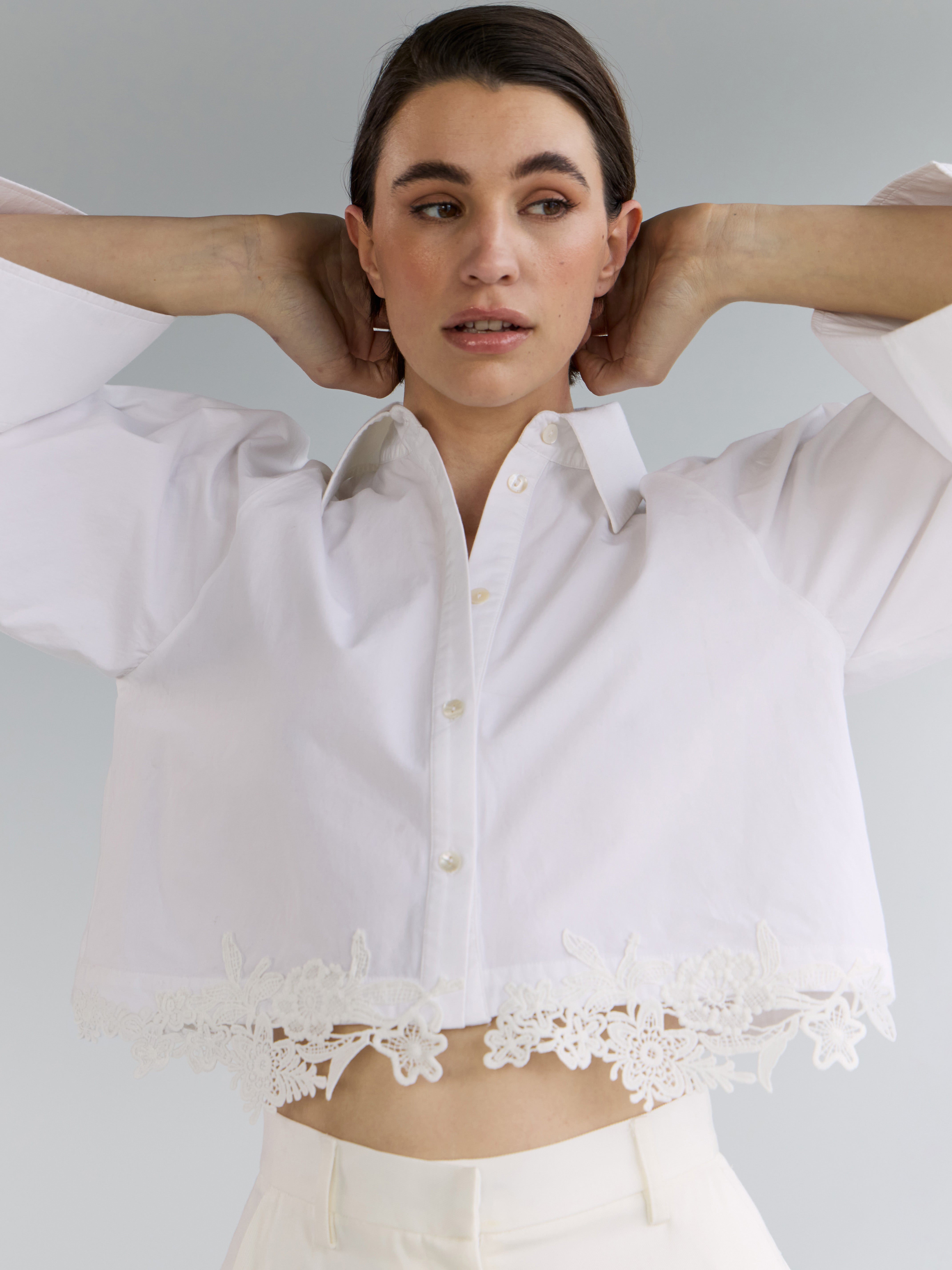 She is Bold lace trim shirt