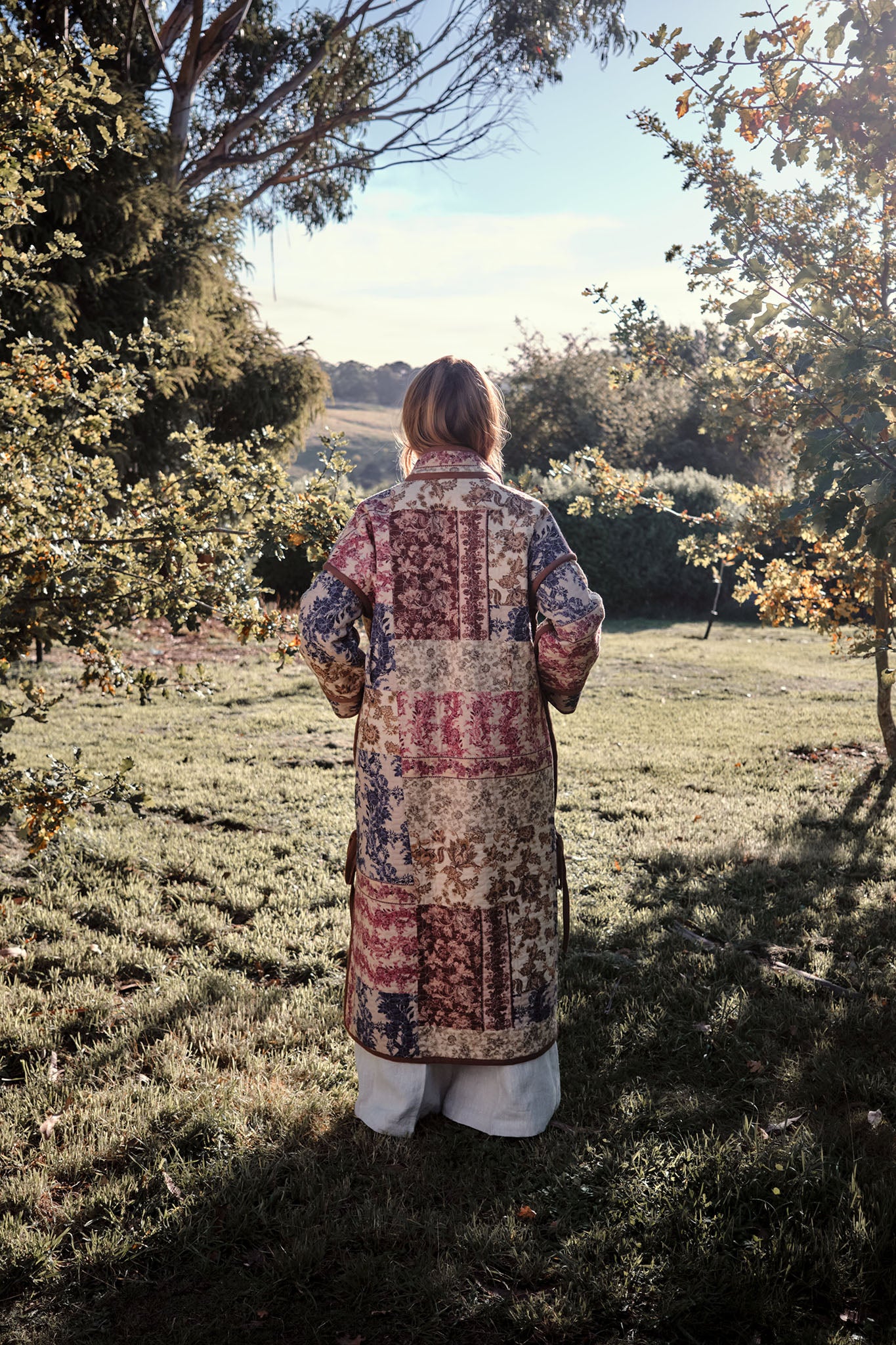 She is Intricate patchwork quilted coat